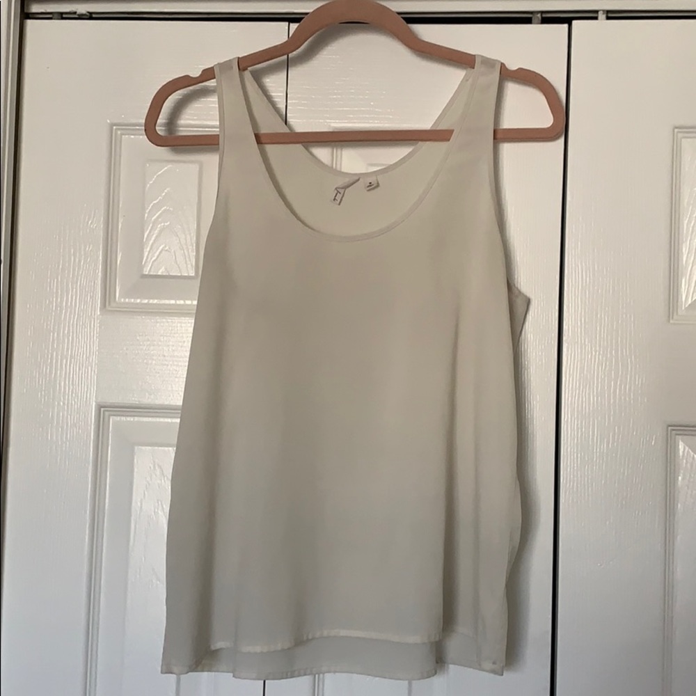 White sleeveless blouse